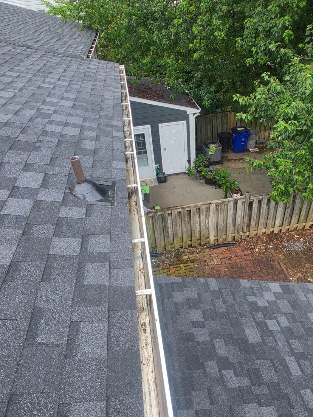 A newly installed plumbing vent flashing — a small repair that stops some of the most stubborn roof leaks.